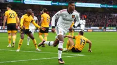 Manchester United forward Marcus Rashford celebrates scoring against Wolves