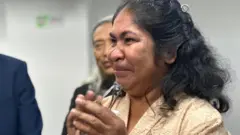 Meriance Kabu menghadiri persidangan di Malaysia, Selasa (30/07).