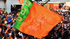 A BJP flag is waved at a rally