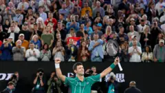 Novak Djokovic celebrates winning the 2020 Australian Open