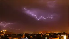 A view of thunder lightning strikes over the sky at walled city of Jaipur , Rajasthan , India on 19 May, 2017.