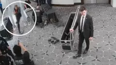 Imagem de homem invadindo local de segurança