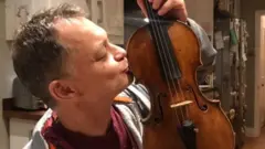Stephen Morris with his violin