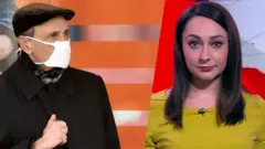 чоловік у масці