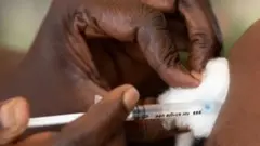 Vaccination en Ouganda.