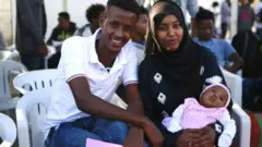 Mu baraye bageze mu Rwanda HCR ivuga ko umuto muri bo ari Hadia afise amezi abiri, yavukiye mu kigo bari bacumbikiwemwo muri Libya