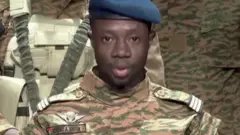 Army officer announces coup
