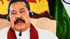 Modi, Rajapaksa meet