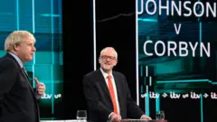 টিভিতে জনসন-করবিন বিতর্ক