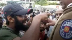 ත්‍රස්ත විමර්ශන ඒකකය ඉදිරිපිට විරෝධය අතරතුර උණුසුම් තත්ත්වයක්