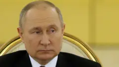 Vladimir Putin.
