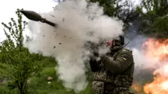 A soldier fires a rocket gun as Ukrainian soldiers in the Donetsk region attend intensive combat training by using both domestic and foreign weapons amid Russia-Ukraine war in Donetsk, Ukraine on 8 May 2023