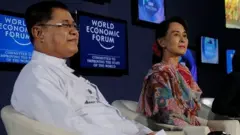 နေပြည်တော်မှာ ၂၀၁၃ ခုနှစ်က ပြုလုပ်တဲ့ BBC World Debate မှာ အတူရတဲ့ ဦးစိုးသိန်းနဲ့ ဒေါ်အောင်ဆန်းစုကြည်