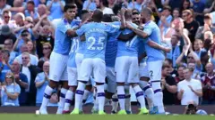 'Yan wasan Man City suna murna bayan sun lallasa Watford da ci 8-0