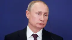 Путин