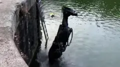 Statue being removed