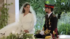 Miss Rajwa Al Saif and Jordan's Crown Prince Hussein shortly before the wedding ceremomy begins