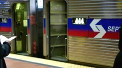 SEPTA conductor stands on the balcony of a Silverliner IV Regional Rail train, in Philadelphia, PA, on April 16, 2018.