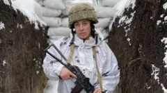 Maria is stationed on Ukraine's eastern front line. "We are standing our ground," she said.