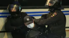 Задержание участника акции