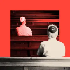 A treated image of two Jewish men sitting together inside a synagogue