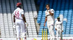 Mohammad Ali (R) of Pakistan after appealing for Justin Greaves (L) of West Indies dismissal during the 2nd day of 1st Test match between West Indies and Pakistan at Brian Lara Cricket Academy in Tarouba, Trinidad and Tobago on July 26, 2026.