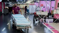A medical professional pushes a hospital bed at an emergency hospital in Haifa, northern Israel