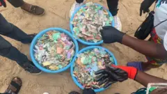Plastics and styrofoams dem pick for Lagos beach