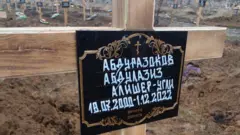 Luganskdagi xoch o‘rnatilgan o‘zbekistonlik qabri. 