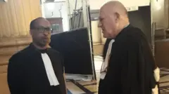Maître André Martin Karongozi (i bubamfu) aburanira imiryango y'ababuze  na Maître Jean Flamme aburanira Pierre  Basabose