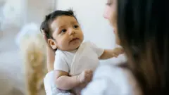 south asian baby with mother 