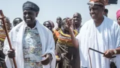  Wiiliyaam Ruuttoo (gama bitaan) bulchaa kaawontii Maarsaabiit Mohaammad Muhaammud Alii (karaa mirgaan) guyyaa kabaja aadaa 11ffaa Waxabajji 28, 2018 Turkaanaatti kabajametti