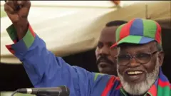 MU gihe ca bwa butegetsi bw'ivangura bwa Afrika y'Epfo yatwara Namibia gikoloni, Nujoma yiswe "umuterabwoba agendera ku vyiyumviro vy'aba-Marxistes"