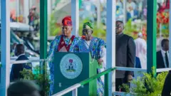 President Bola Tinubu and im Vice President Kashim Shettima stand togeda