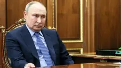 Путін