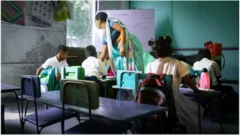 A Sri Lankan teacher teaches in a school.