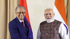 नवीन रामगूलम और नरेंद्र मोदी