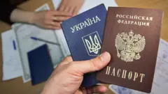 Украинский и российский паспорта, центр выдачи российских паспортов в Луганске