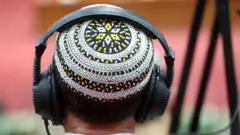 man using headphones