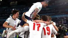 England's players celebrate scoring against Ukraine in the quarter-finals of Euro 2020