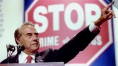 Bob Dole delivers a speech in 1996