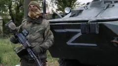 A Russian soldier in Mariupol