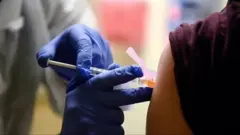 вакцина
