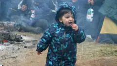 Migrantes en la frontera polaco-bielorrusa
