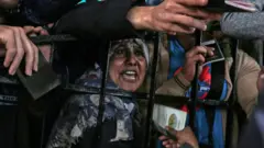 Palestinians gather at the Rafah border crossing in southern Gaza, April 2018