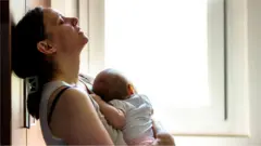 Madre con su bebé.