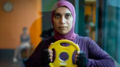 A woman working out in a gym