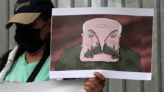 Пикет с карикатурой на лукашенко