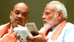 નરેન્દ્ર મોદી અને અમિત શાહ