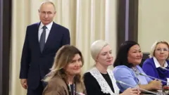Путин